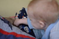 dsc_0080.jpg Grant helps us wake up his brother.