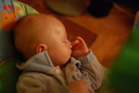 dsc_7694.jpg Devin is getting better and better at finding his thumb.