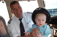 dsc_8294.jpg Devin even got to visit the cockpit and meet the captain!