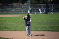 dsc_0922.jpg Devin follows the time-honored tradition of chatting it up while on base.