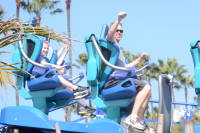 dsc_5136.jpg On 'Manta' at SeaWorld.  Devin rode with a friend he made in line.