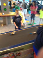 img_1681.jpg Daddy's favorite part, which Devin also loved, was the car race/build spot.