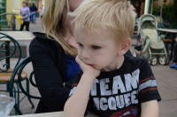 dsc_4455.jpg Grant realized it'll be two more years before he's tall enough to go on the good rides.